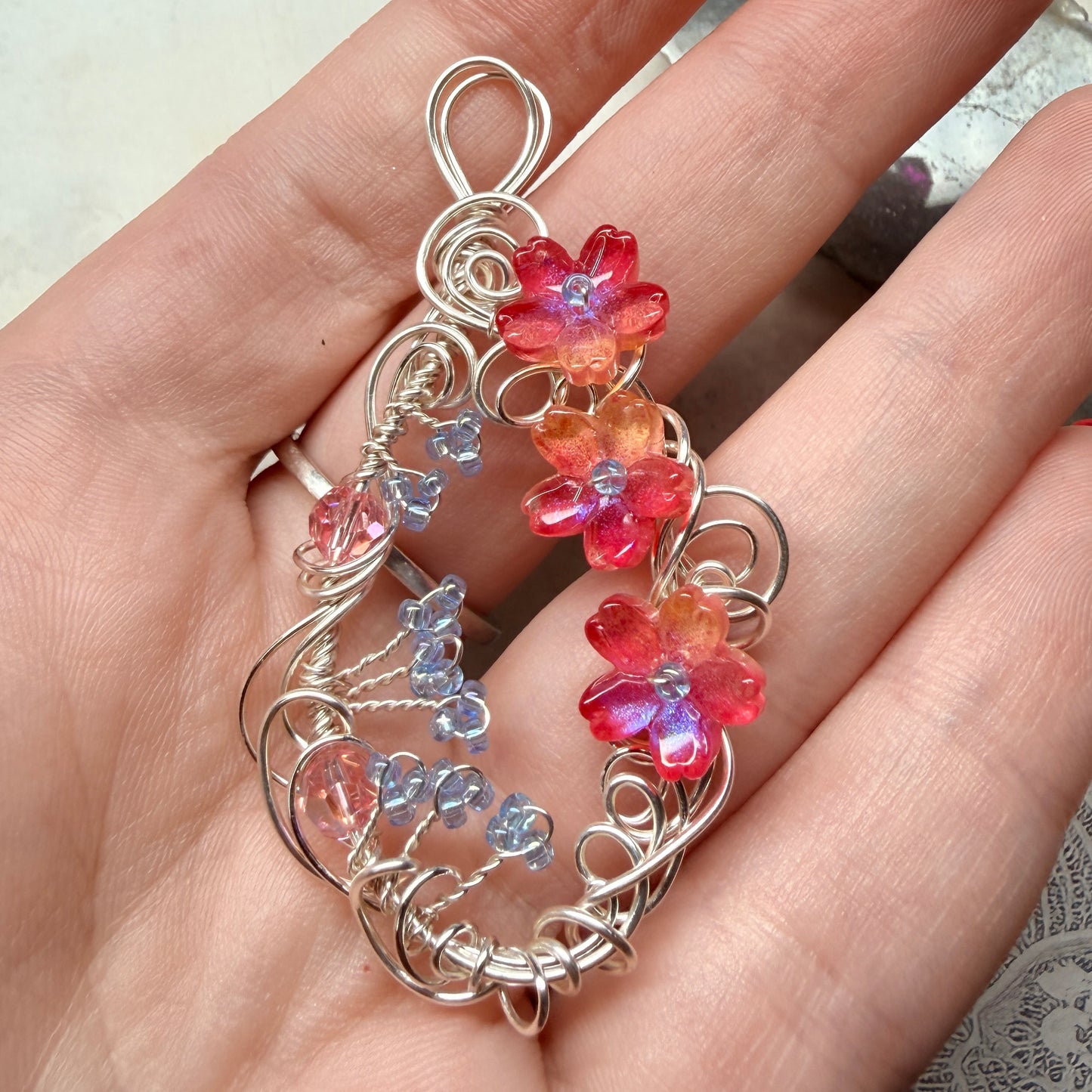 under summer skies: red floral pendant
