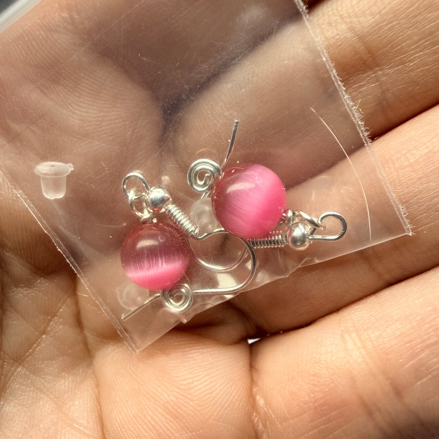 Magpie Rummage Sale - pink cat’s eye glass