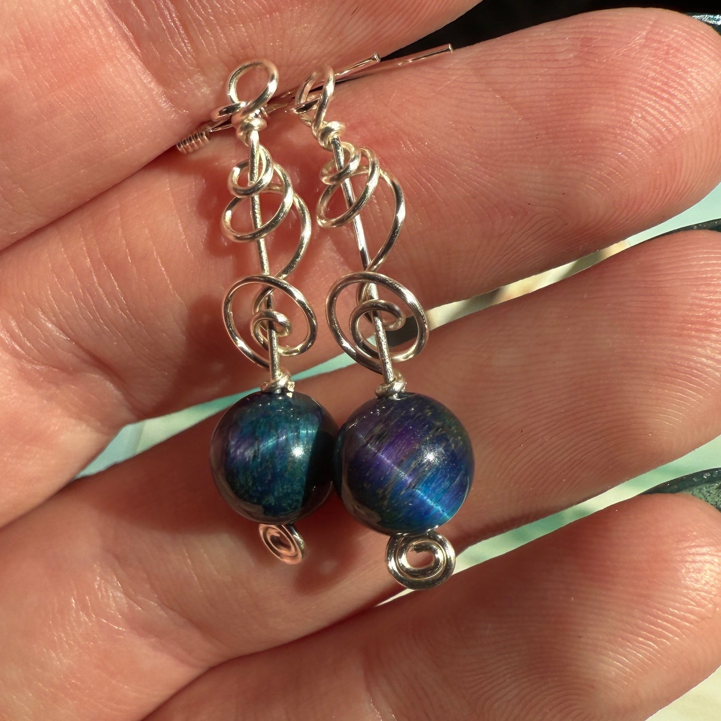 on the turning tide - nebula tigersye earrings