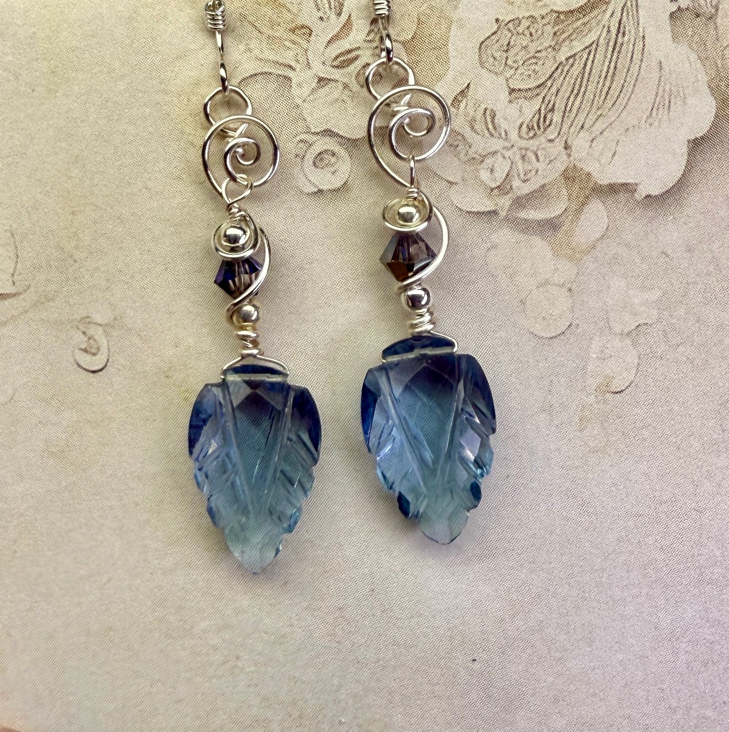 on the turning tide - carved blue earrings