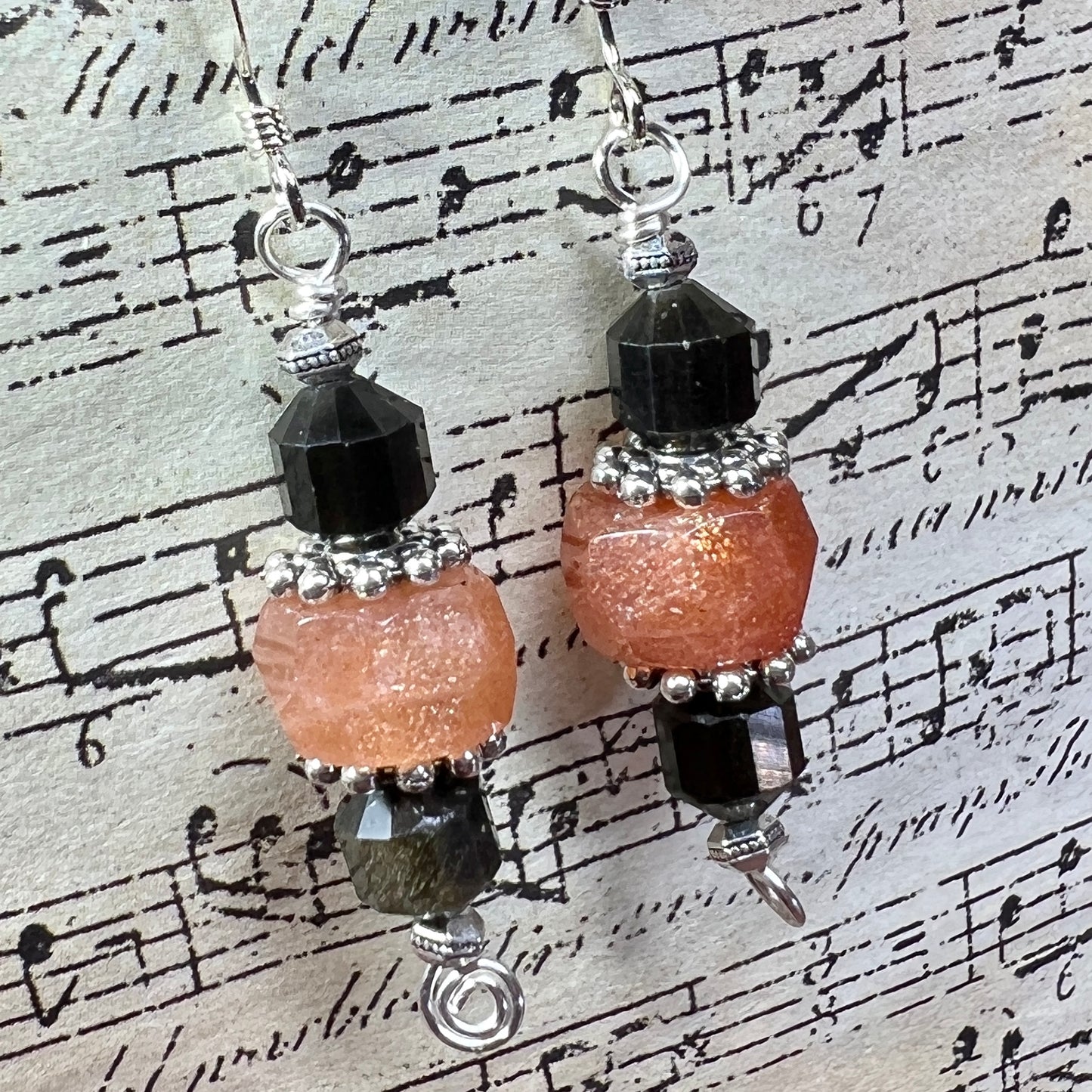 Tiny Evil Genius Earrings: sunstone and obsidian