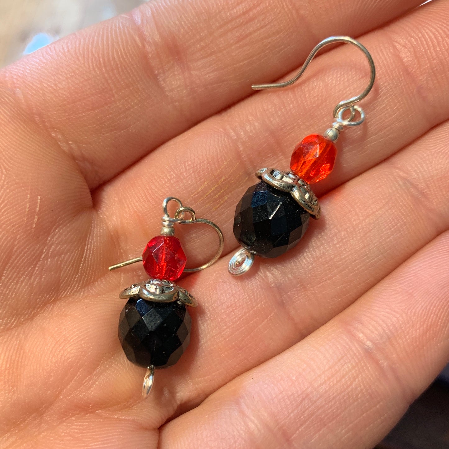 Tiny Evil Genius Earrings: black with two shades of orange