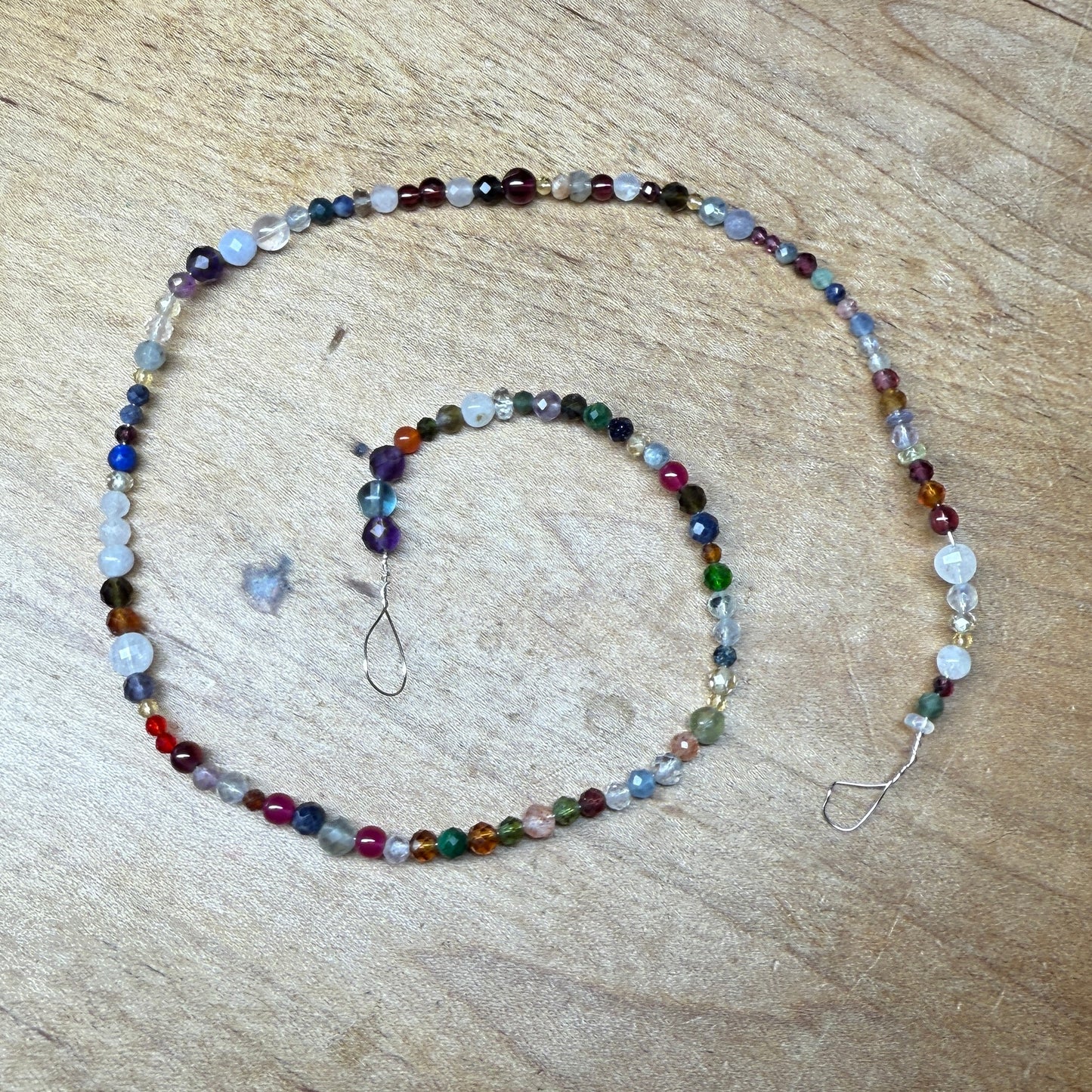 what is this, a scoop for ants? (tiny gemstone bead scoops)