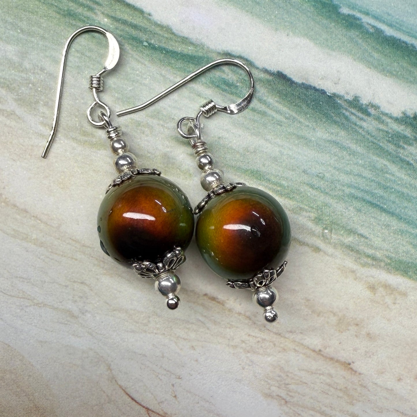 on the turning tide - thermal color-shift earrings