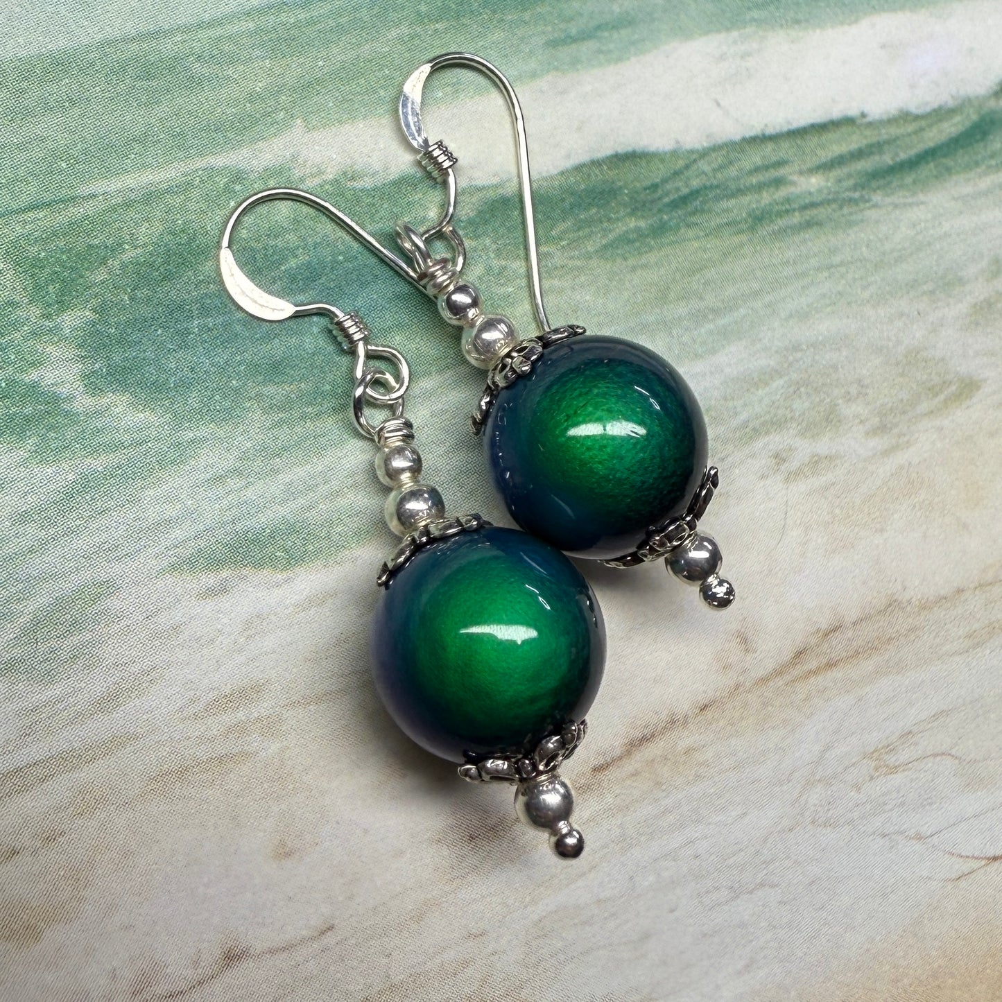 on the turning tide - thermal color-shift earrings