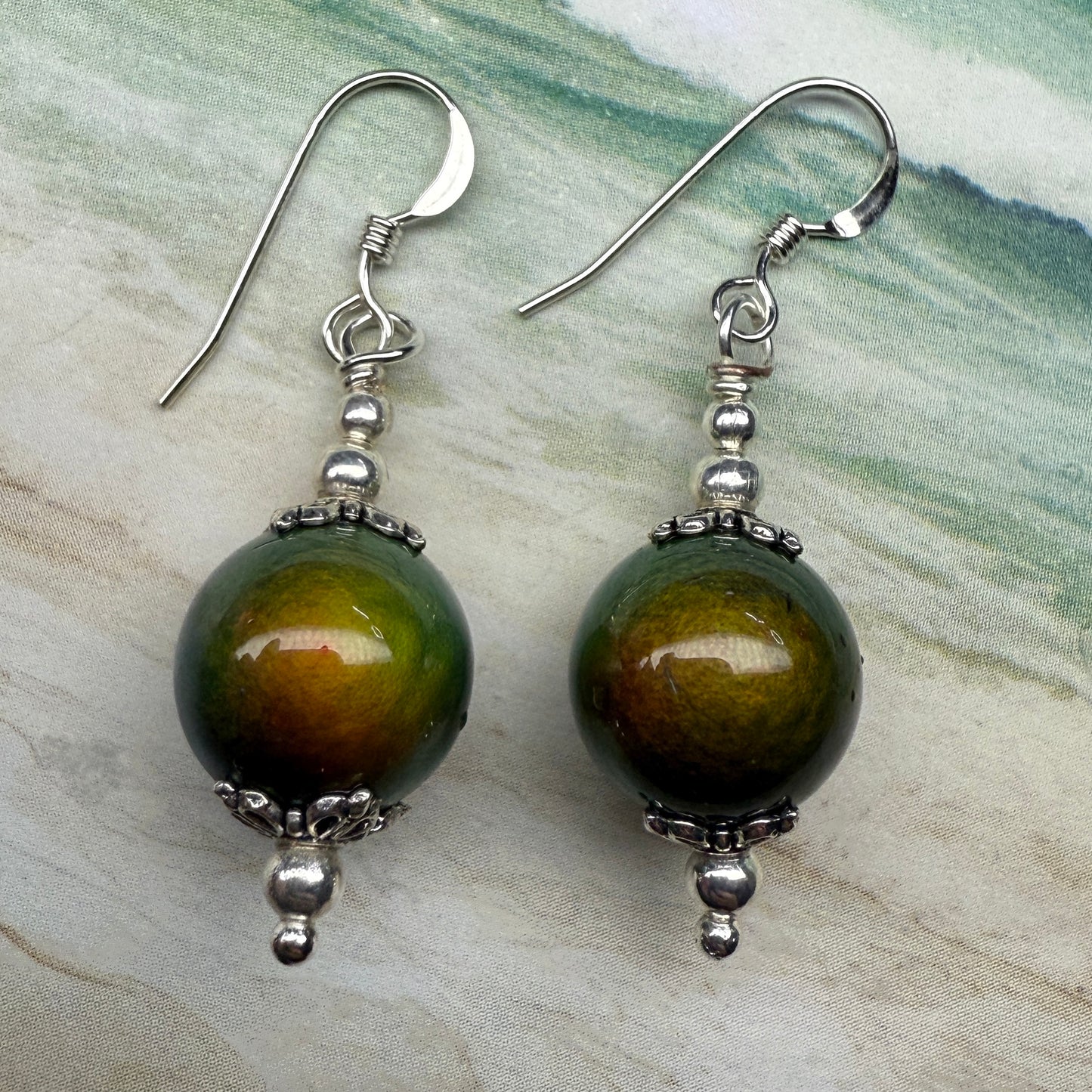 on the turning tide - thermal color-shift earrings