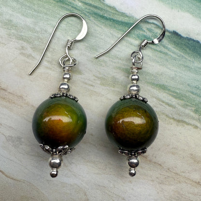 on the turning tide - thermal color-shift earrings