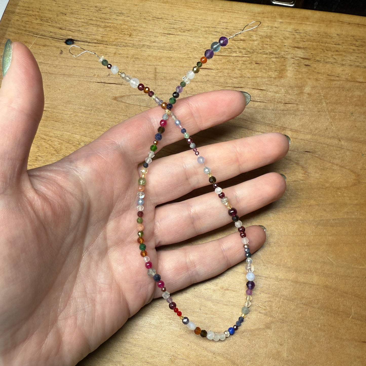 what is this, a scoop for ants? (tiny gemstone bead scoops)