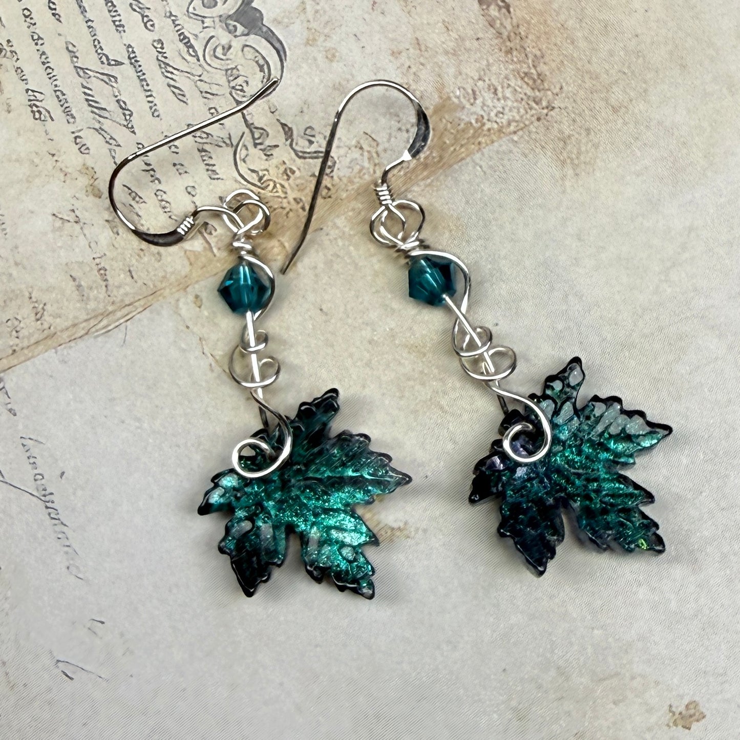 under summer skies: dark teal leaf earrings
