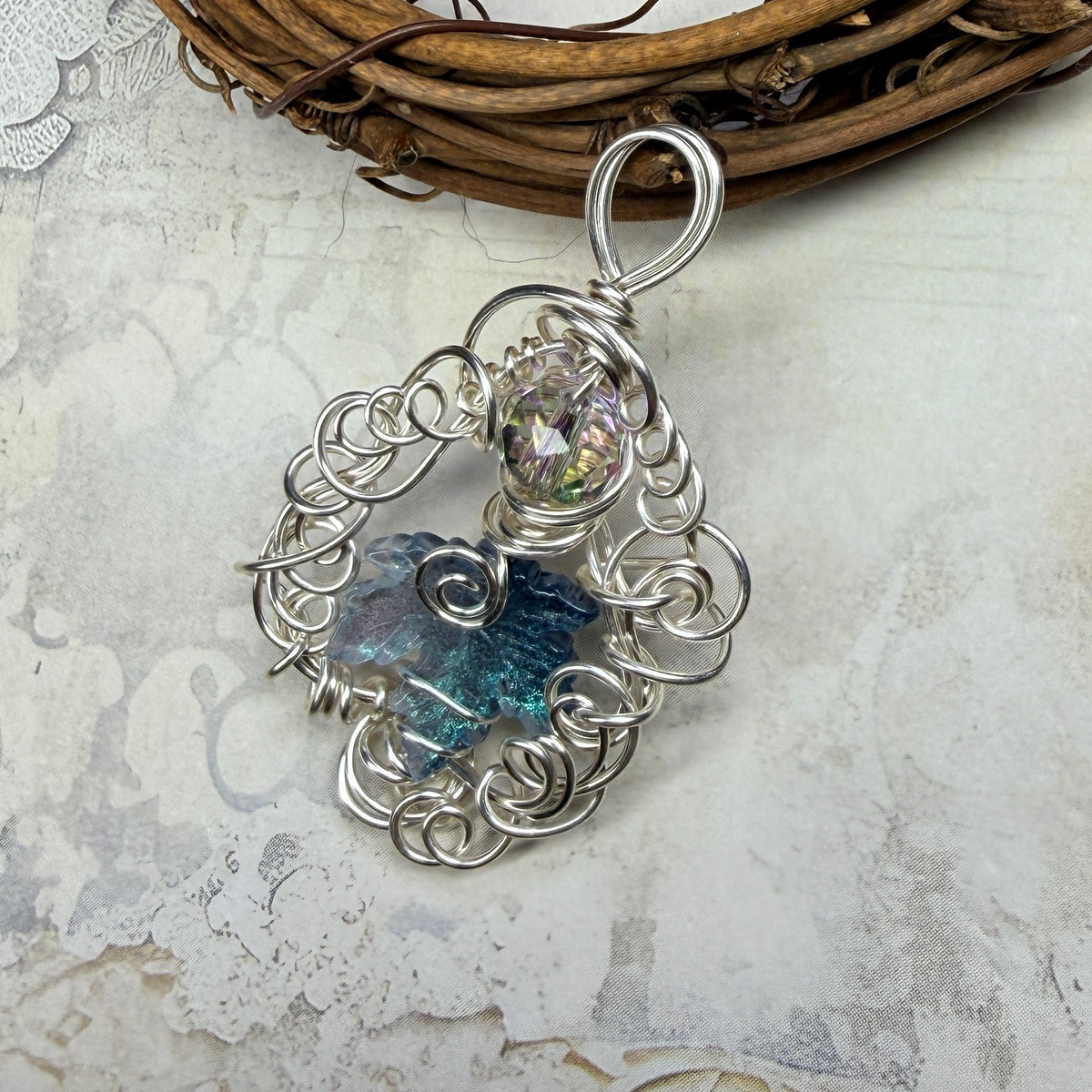 on autumn winds: light teal pendant