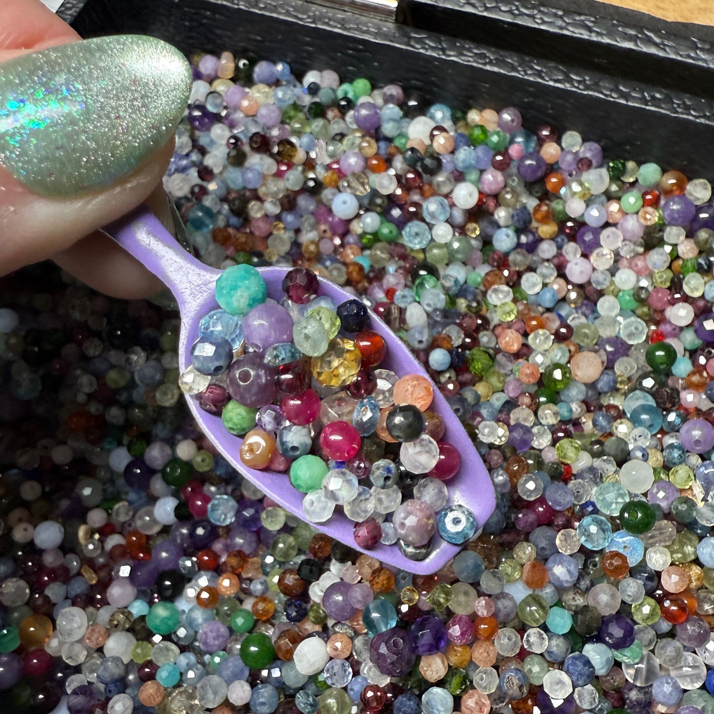 what is this, a scoop for ants? (tiny gemstone bead scoops)