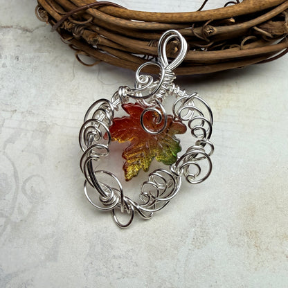 on autumn winds: green and orange leaf pendant