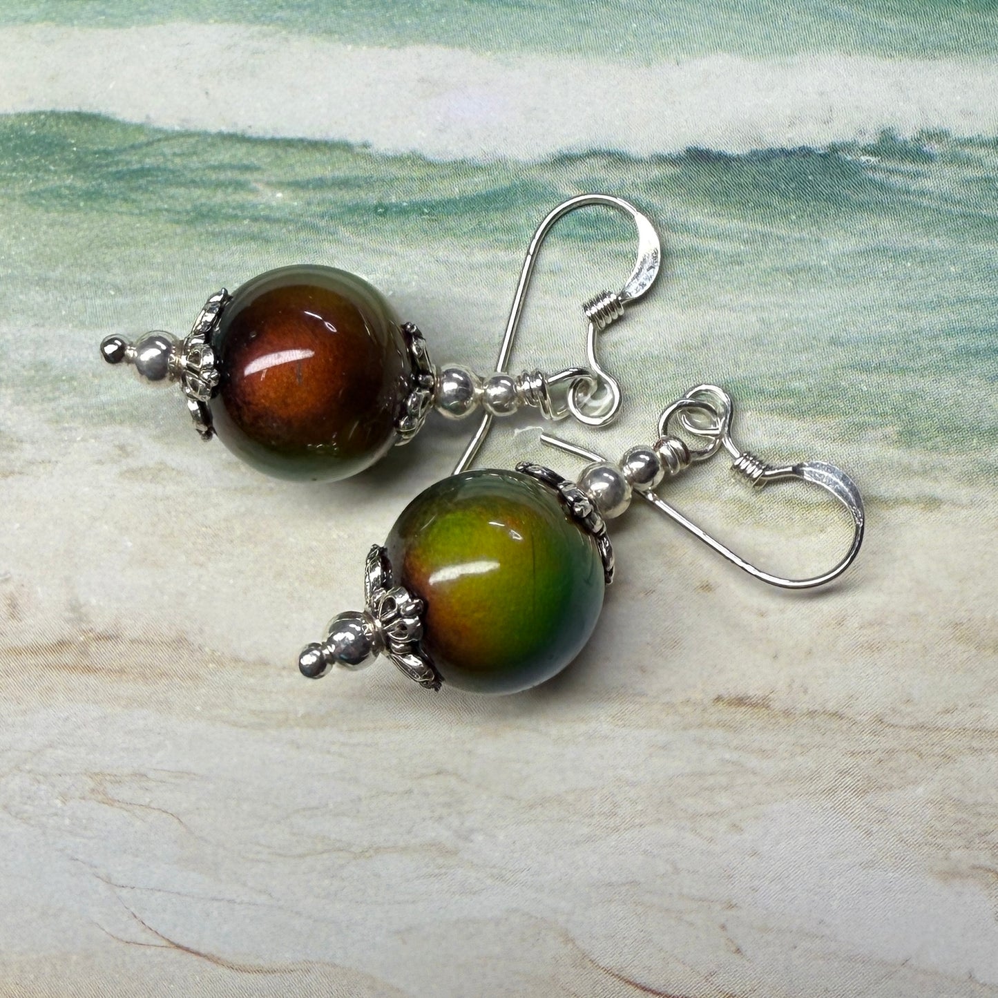 on the turning tide - thermal color-shift earrings