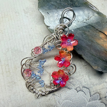 under summer skies: red floral pendant