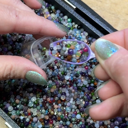 what is this, a scoop for ants? (tiny gemstone bead scoops)