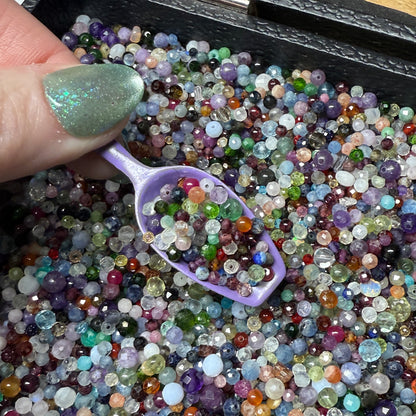 what is this, a scoop for ants? (tiny gemstone bead scoops)