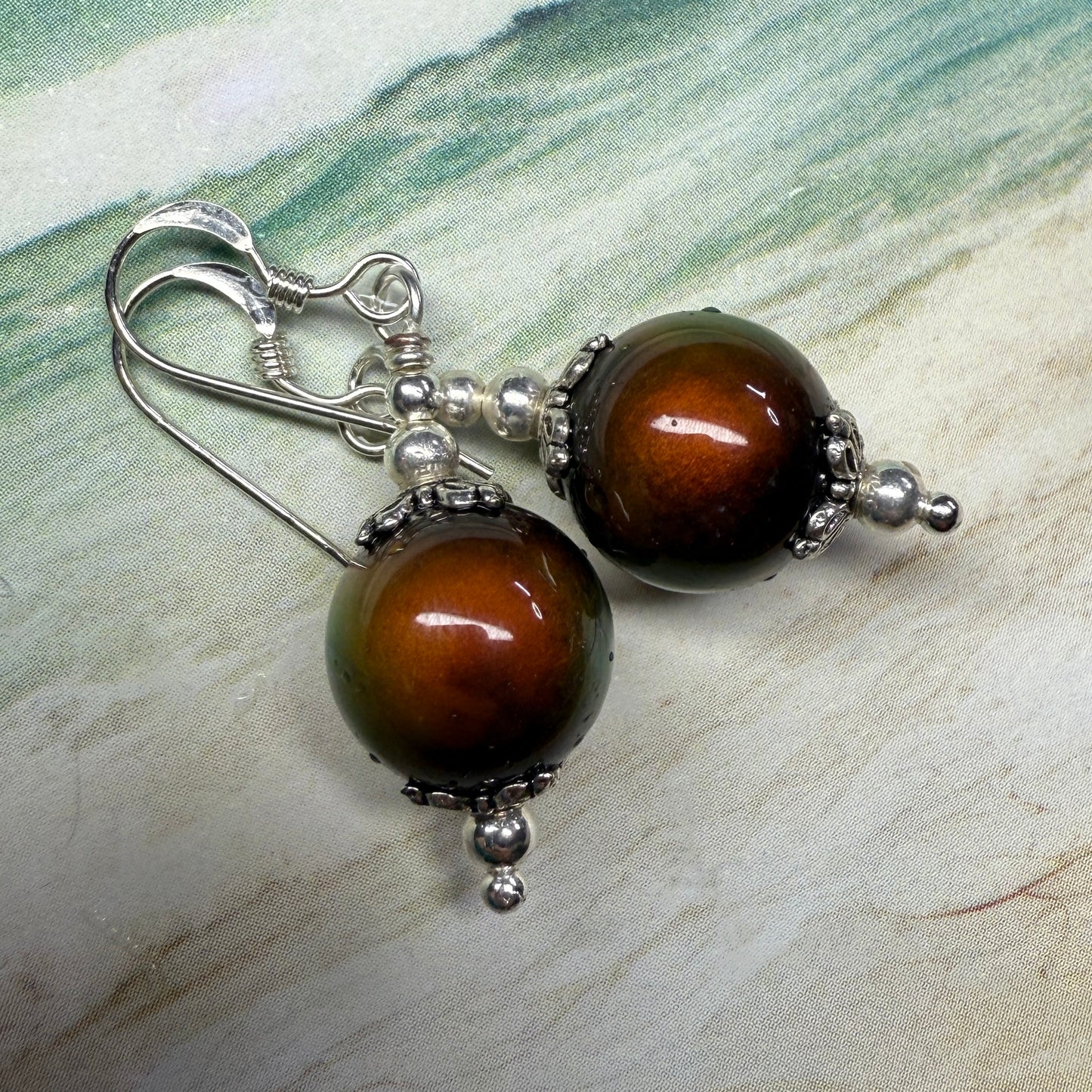 on the turning tide - thermal color-shift earrings