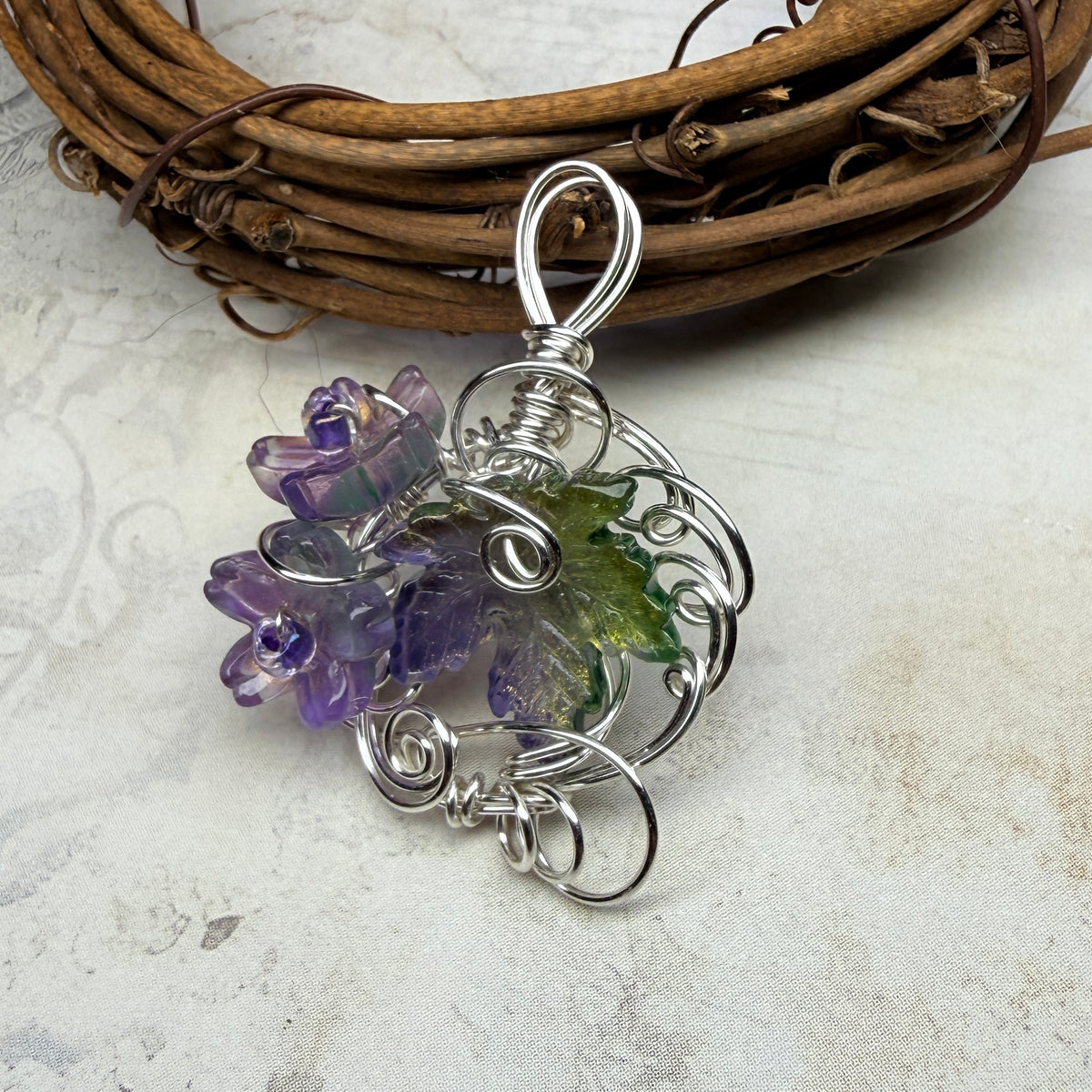 on autumn winds: purple and green pendant