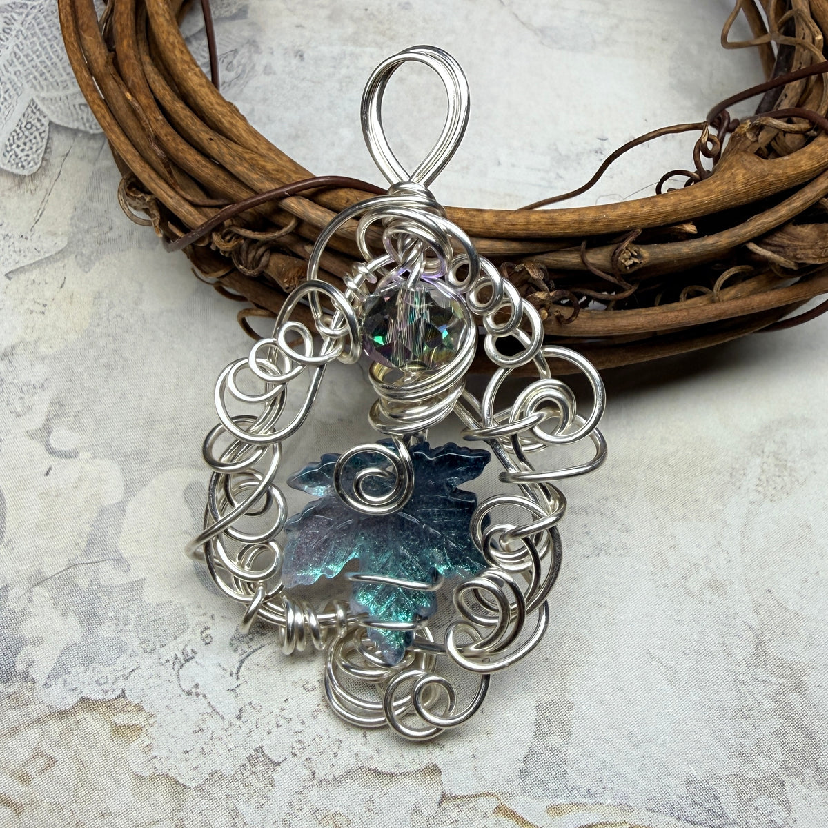 on autumn winds: light teal pendant