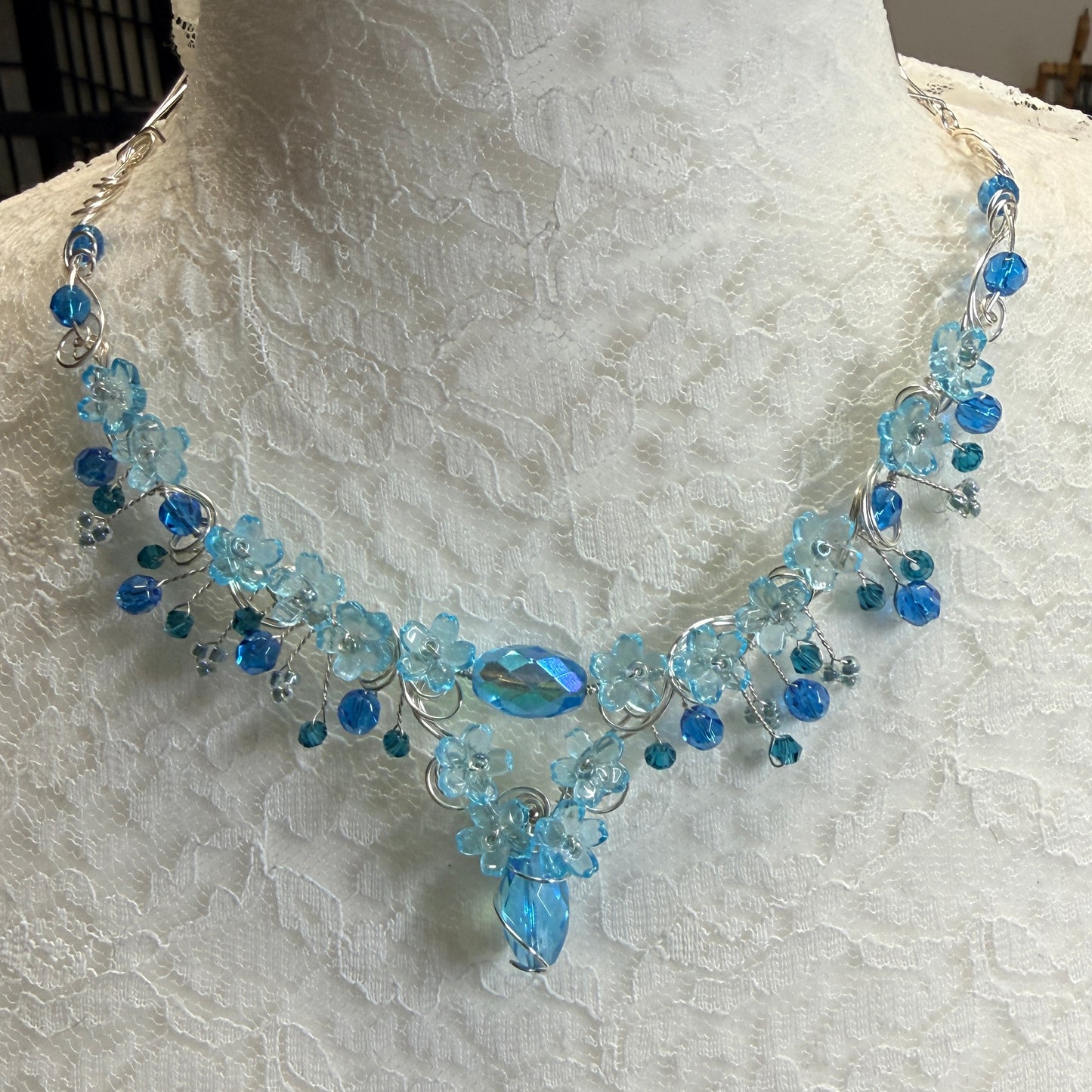 under summer skies: light blue flower necklace