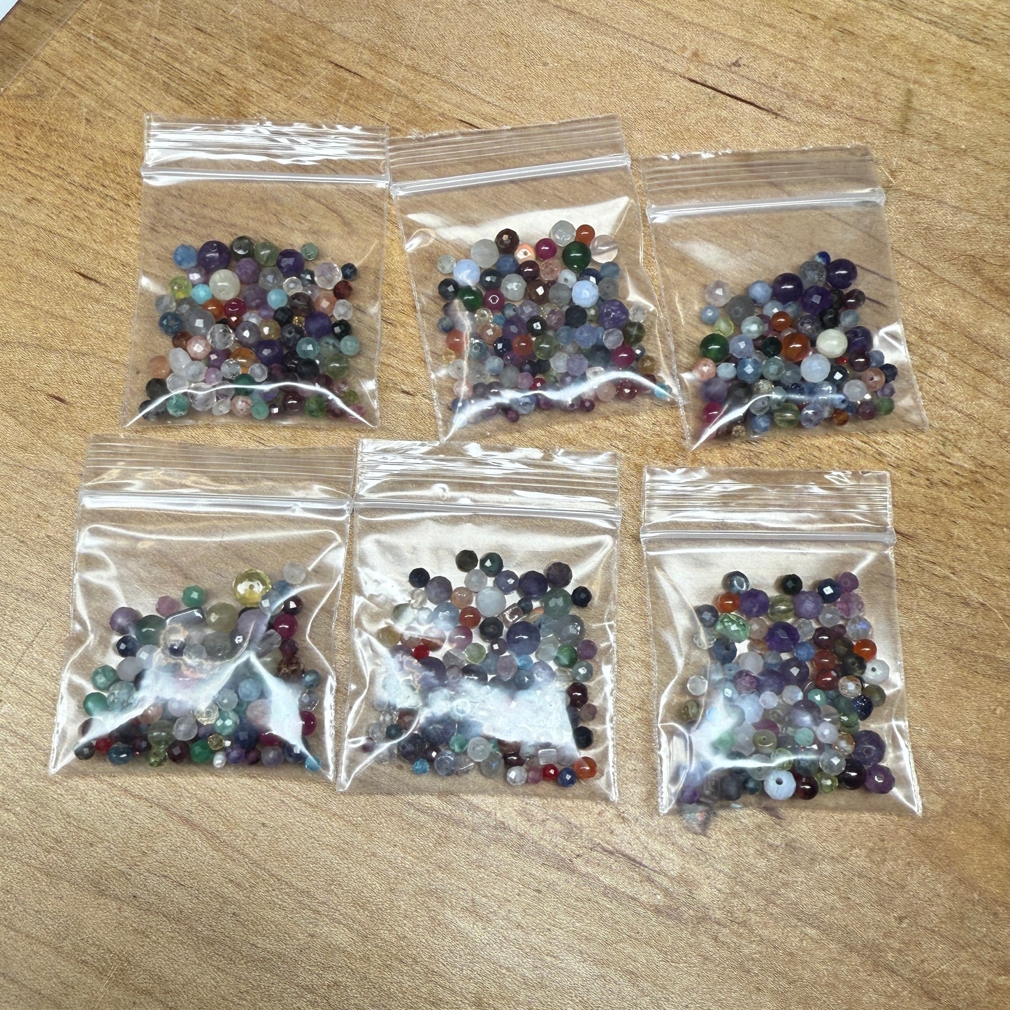 what is this, a scoop for ants? (tiny gemstone bead scoops)