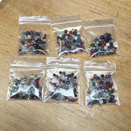 what is this, a scoop for ants? (tiny gemstone bead scoops)