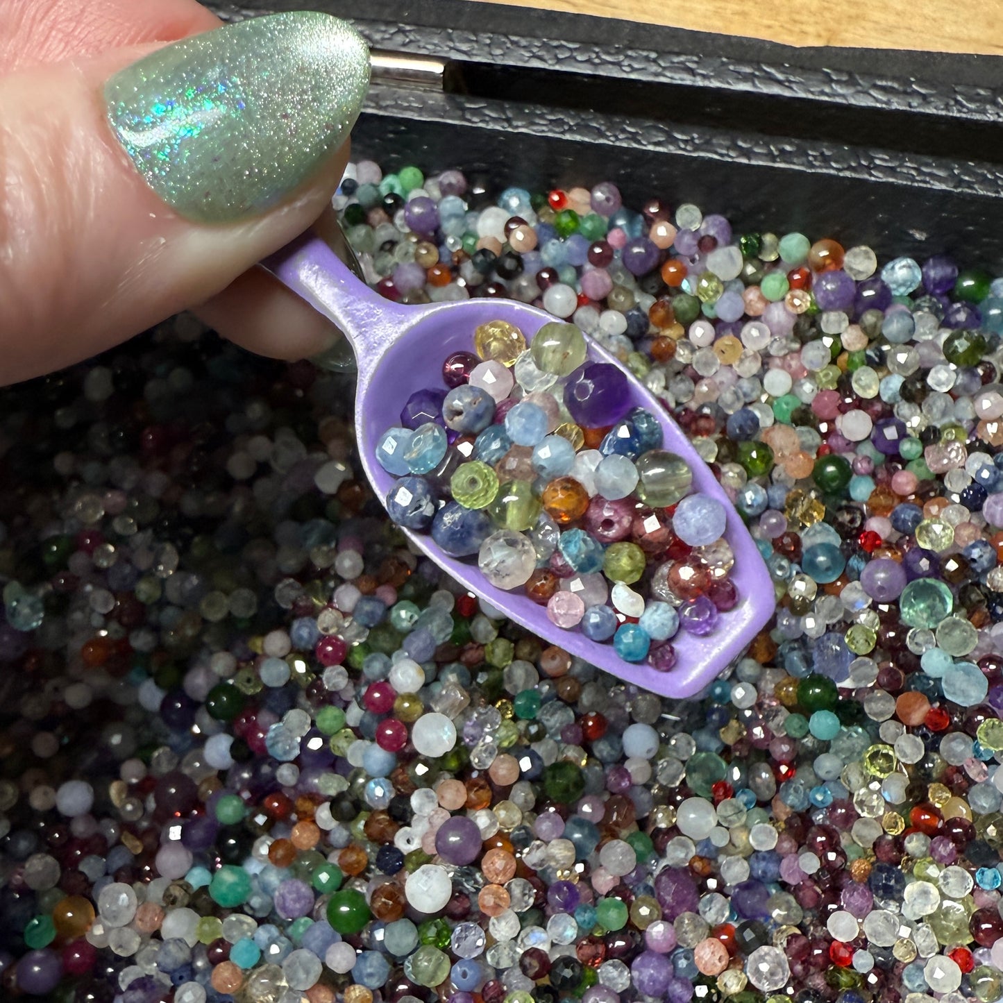 what is this, a scoop for ants? (tiny gemstone bead scoops)