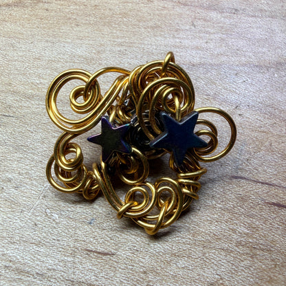 Magpie Rummage Sale - hematite star broach