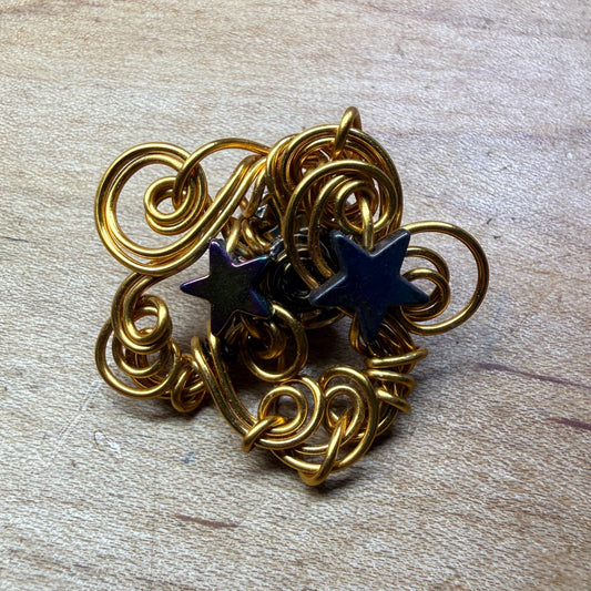 Magpie Rummage Sale - hematite star broach