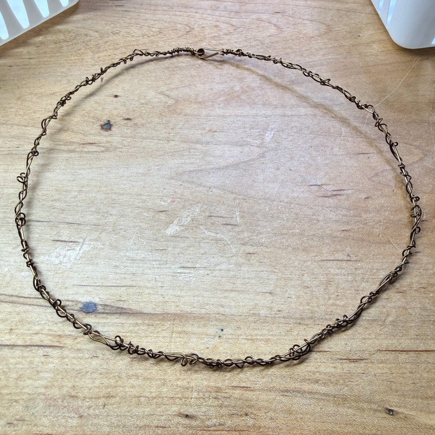 Magpie Rummage Sale - 19.25” antiqued brass neckvine