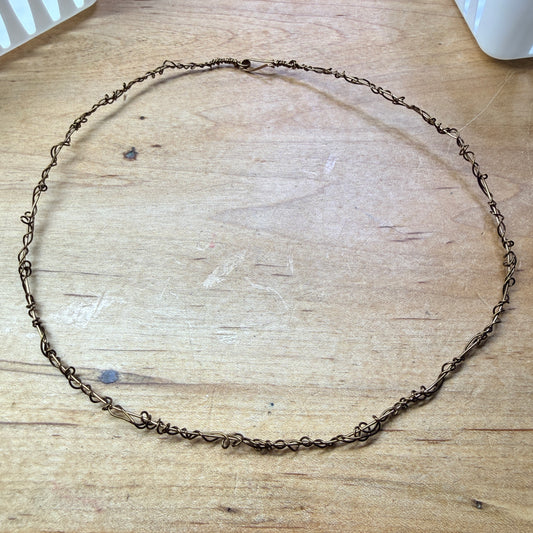 Magpie Rummage Sale - 19.25” antiqued brass neckvine