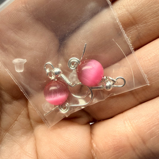 Magpie Rummage Sale - pink cat’s eye glass