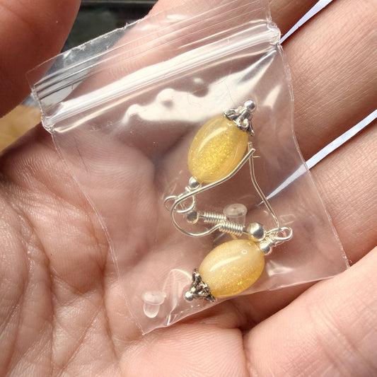 Magpie Rummage Sale - yellow UV reactive earrings