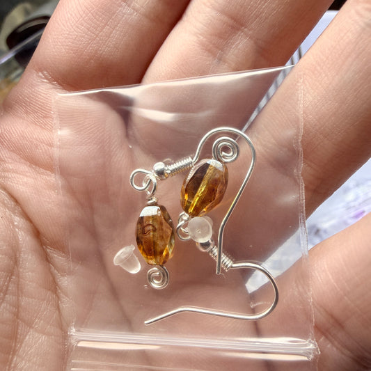 Magpie Rummage Sale - amber Picasso glass