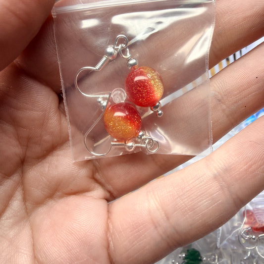 Magpie Rummage Sale - red & gold UV reactive earrings