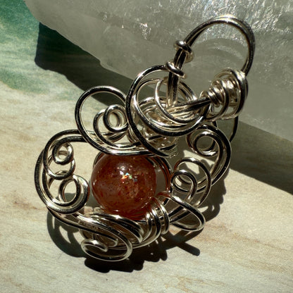 Stillness In The Storm: sunstone pendant