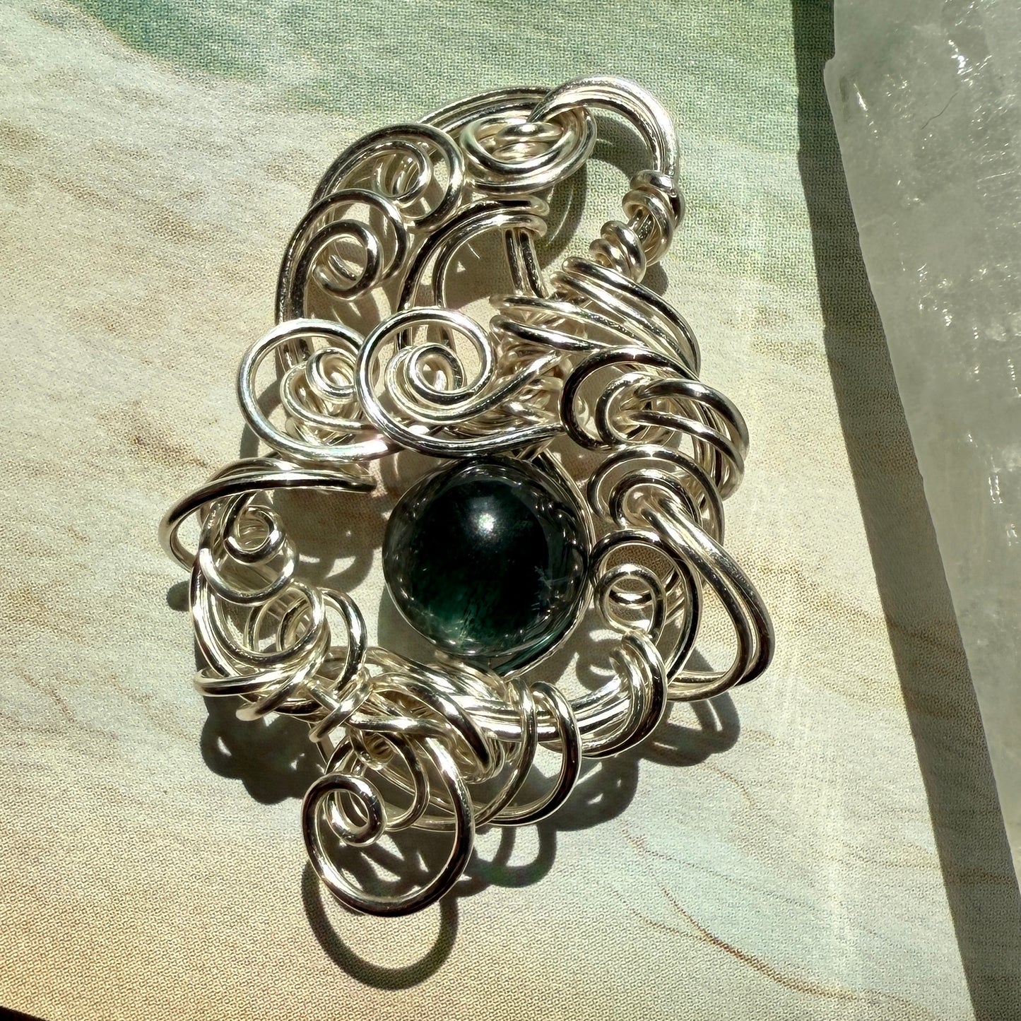 Stillness In The Storm: green kyanite pendant