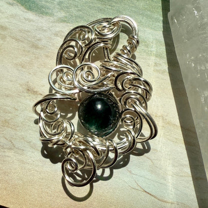 Stillness In The Storm: green kyanite pendant