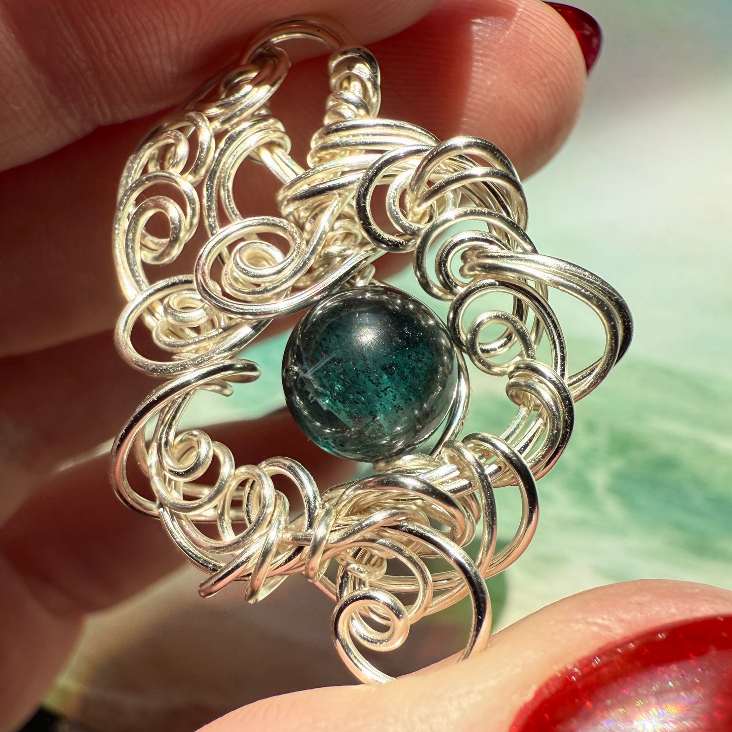 Stillness In The Storm: green kyanite pendant