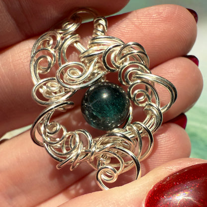 Stillness In The Storm: green kyanite pendant