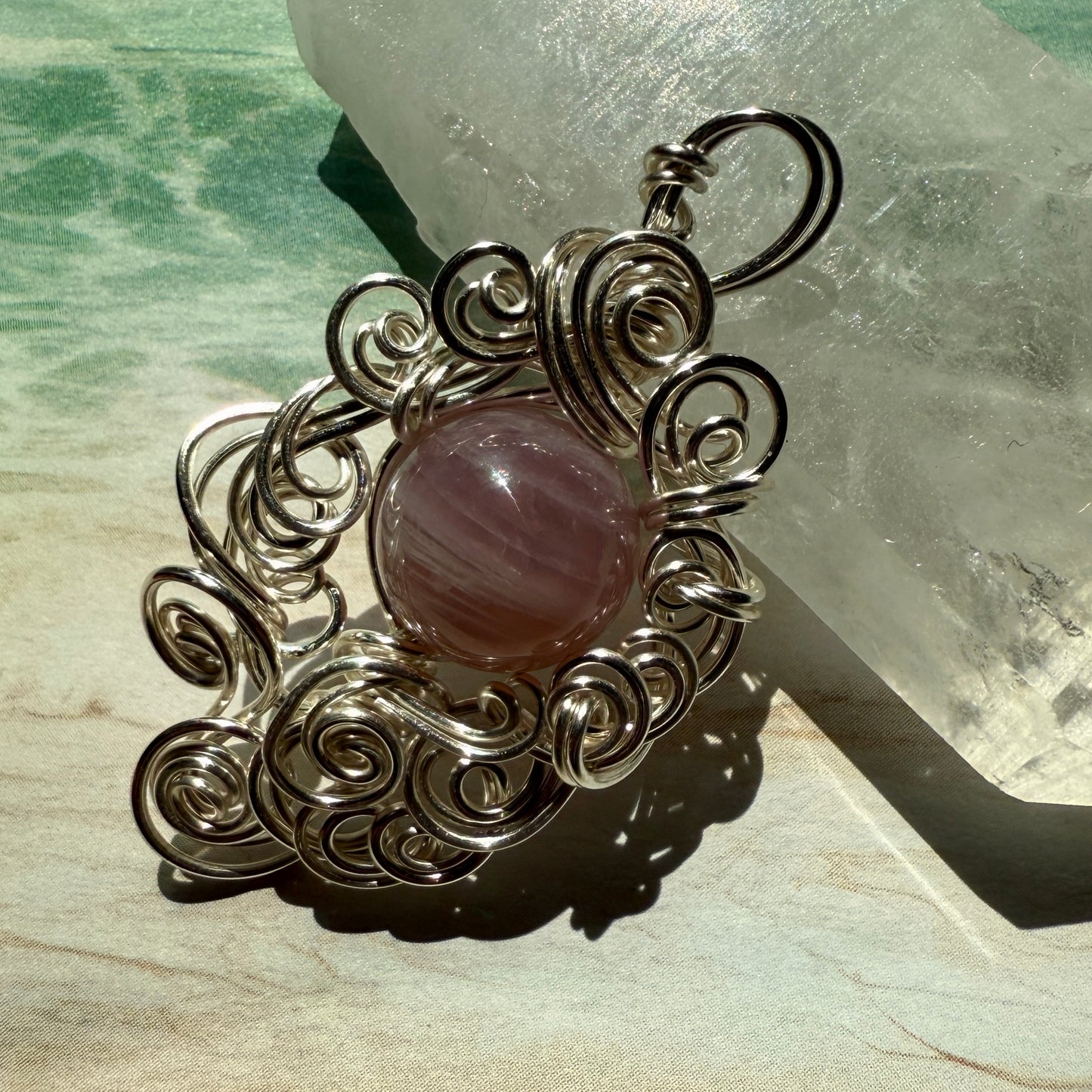 Stillness In The Storm: rose quartz pendant