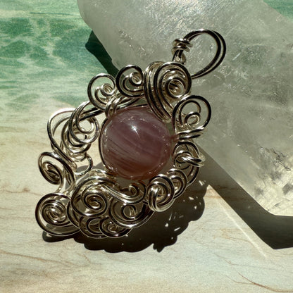 Stillness In The Storm: rose quartz pendant