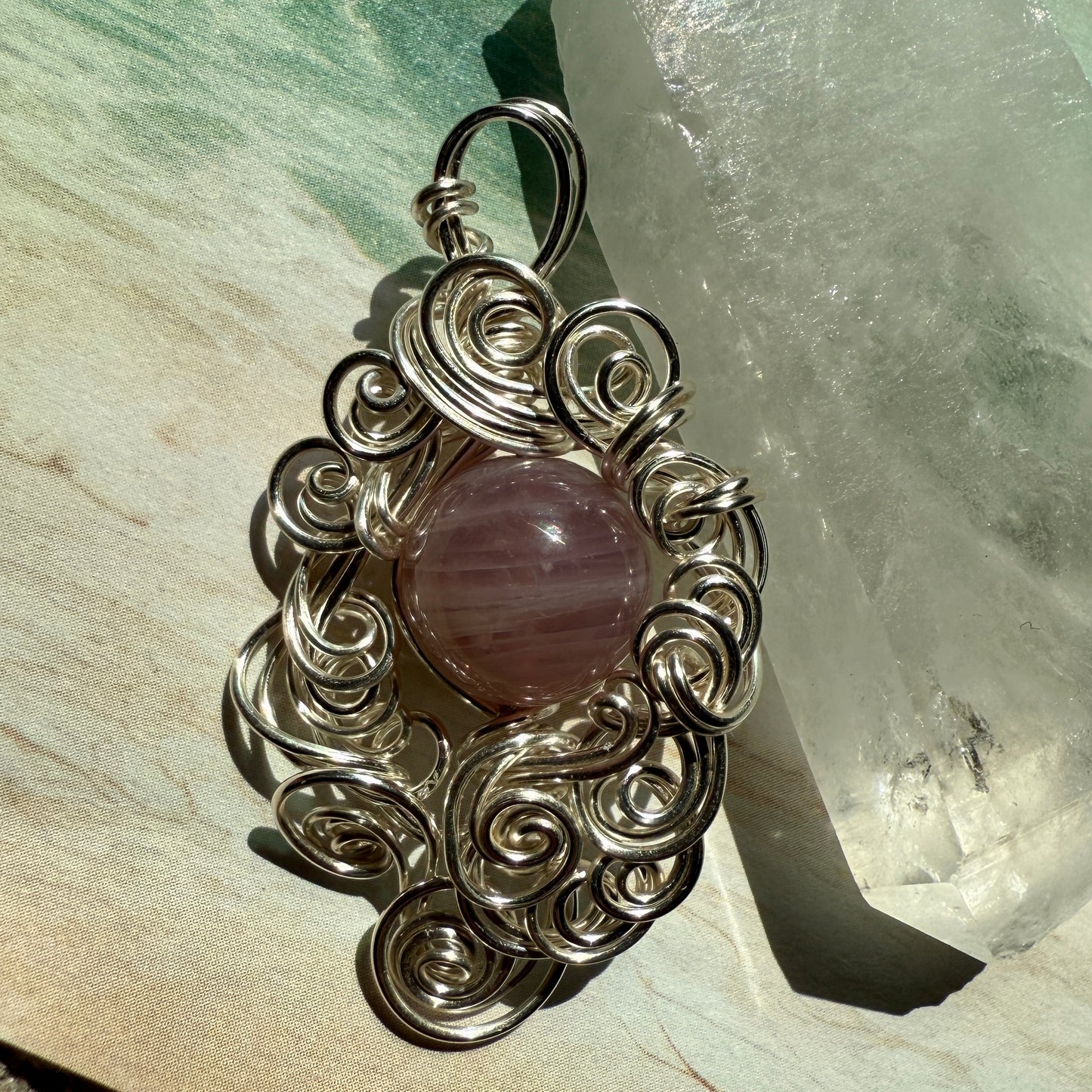 Stillness In The Storm: rose quartz pendant