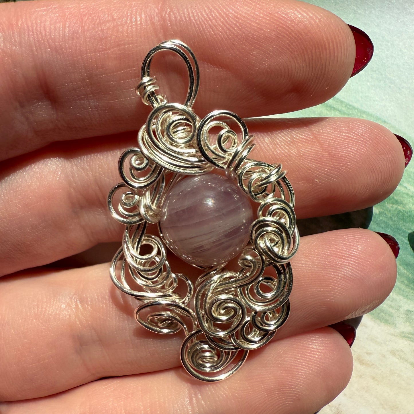 Stillness In The Storm: rose quartz pendant