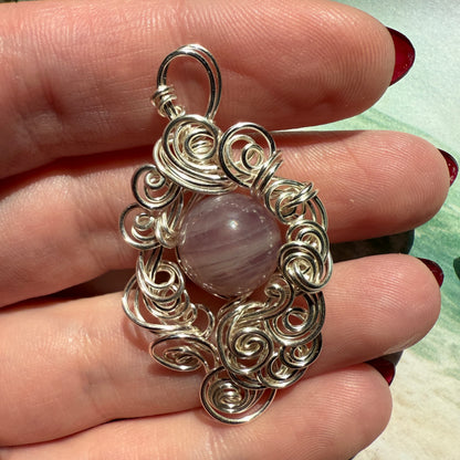 Stillness In The Storm: rose quartz pendant