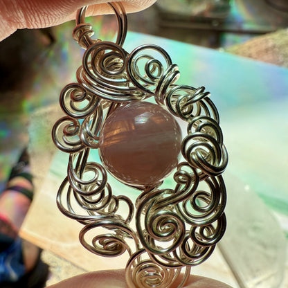 Stillness In The Storm: rose quartz pendant
