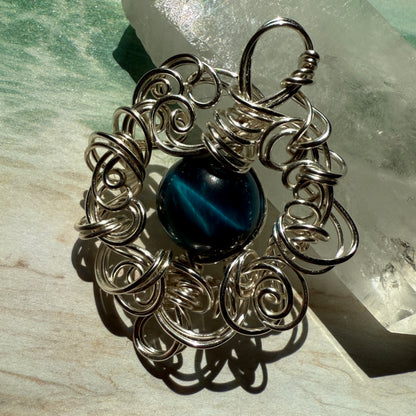 Stillness In The Storm: teal tigerseye pendant