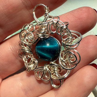 Stillness In The Storm: teal tigerseye pendant