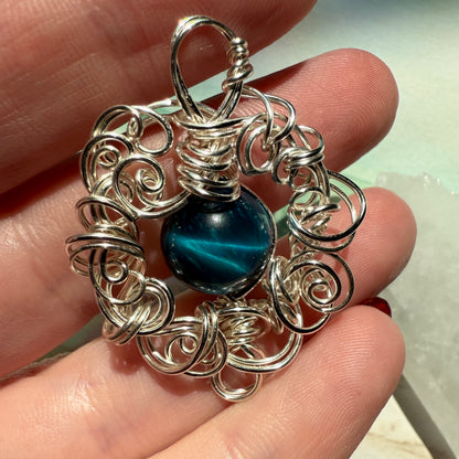 Stillness In The Storm: teal tigerseye pendant