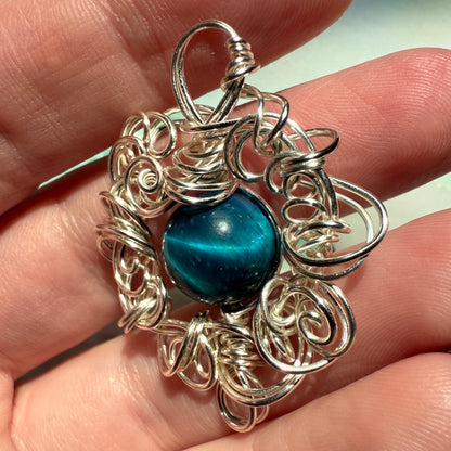 Stillness In The Storm: teal tigerseye pendant